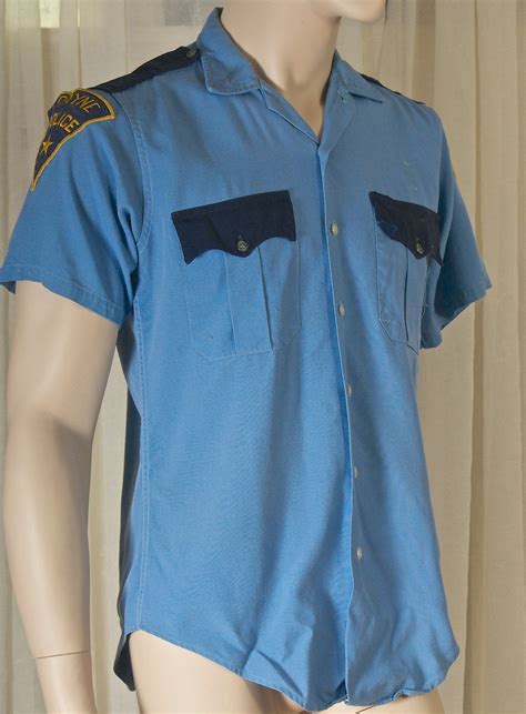 royal blue police uniform shirt.